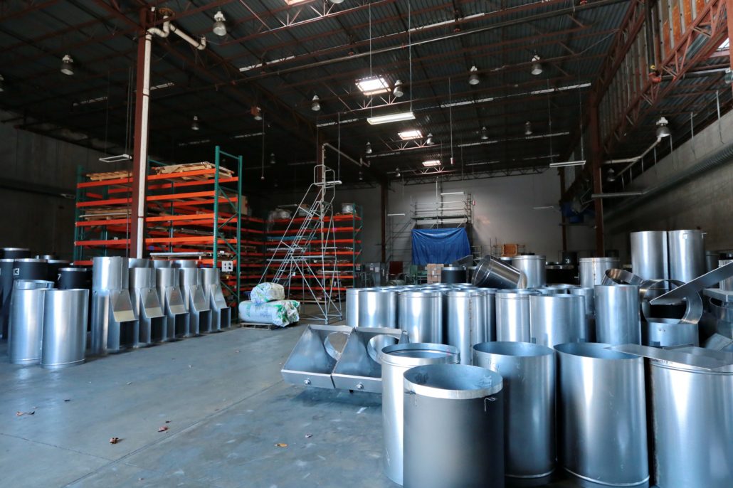 Internal chute components being prepared for shipping inside the CHUTES International warehouse